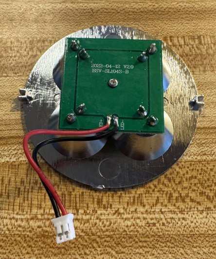 Unscrew the one screw in the center of the rear of the LED PCB to remove it from the lens assembly.