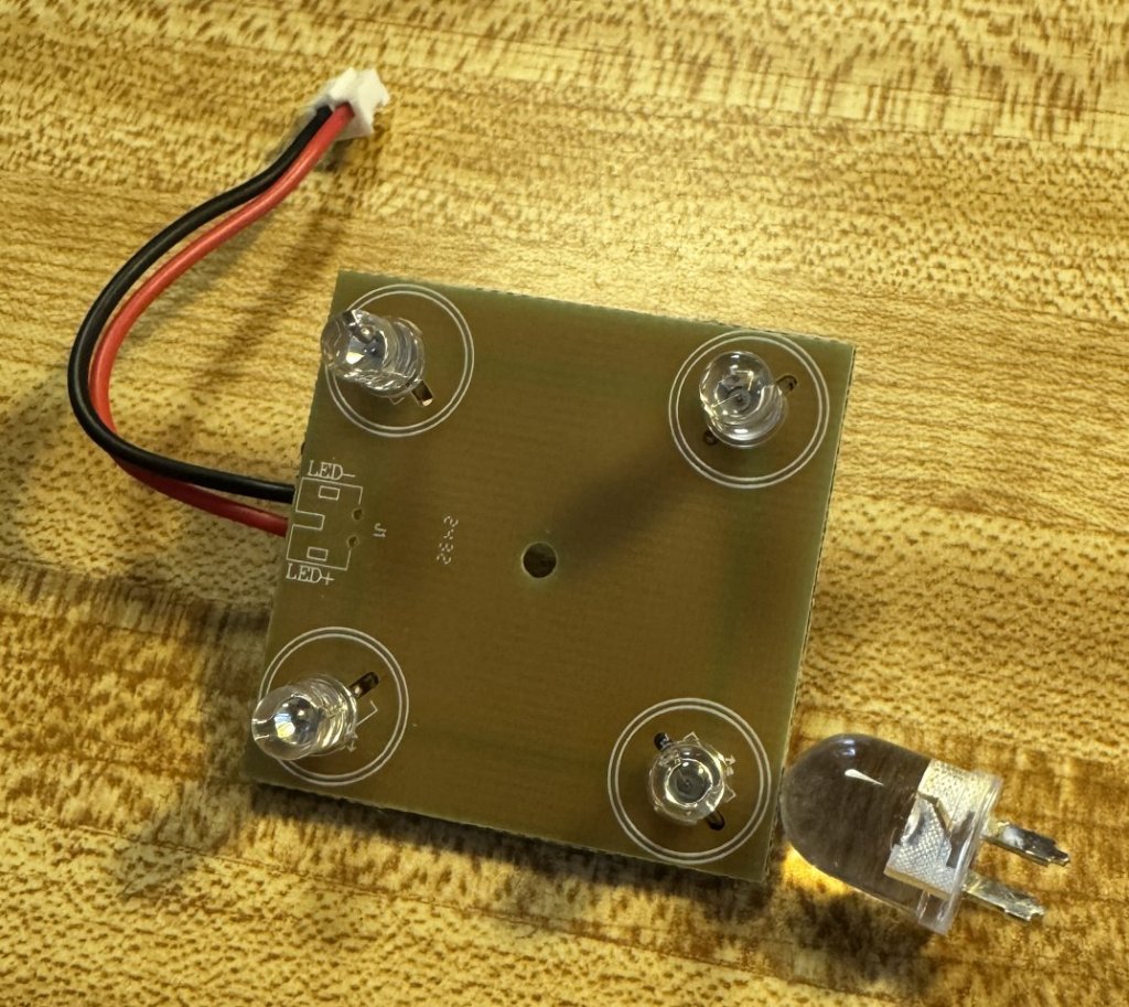 The LED PCB with the new infrared LED's installed.  Note how much bigger the original visible-light LED is?
