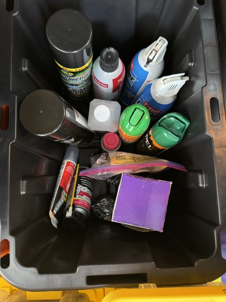 "Liquids and sprays" bin.